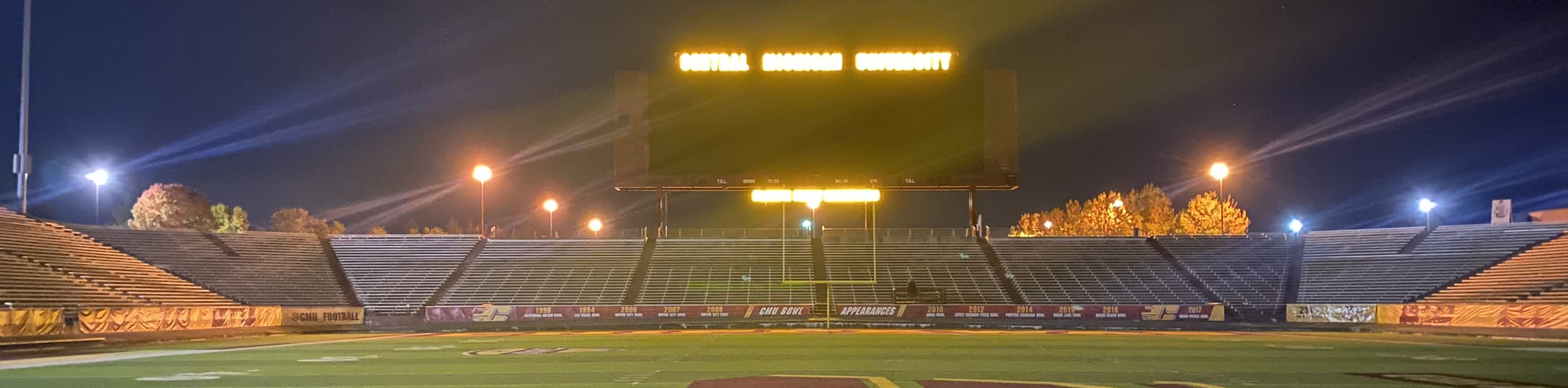 empty football stadium at night under the lights Boise