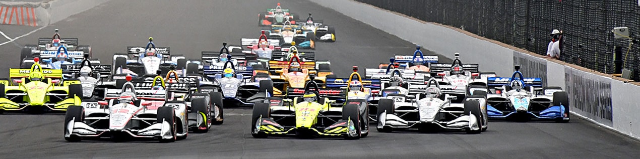 indy cars racing to through the start line Boise